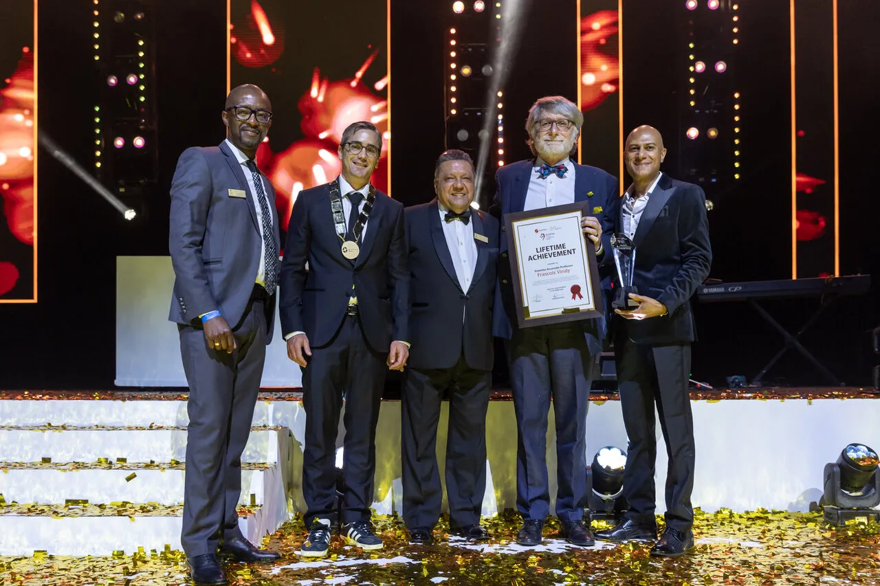 Emeritus Associate Professor Francois Viruly with SAPOA’s Lifetime Achievement Award.