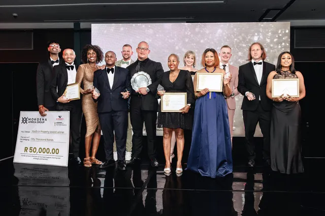 The Investor of the Year 2026 finalists and category winners on stage with their trophies and certificates at The Maslow Hotel in Sandton